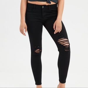 AE black skinny jeans w/ ripped knees. 6 short